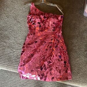 Beautiful pink one shoulder Sherri hill with the reflective pieces covering it